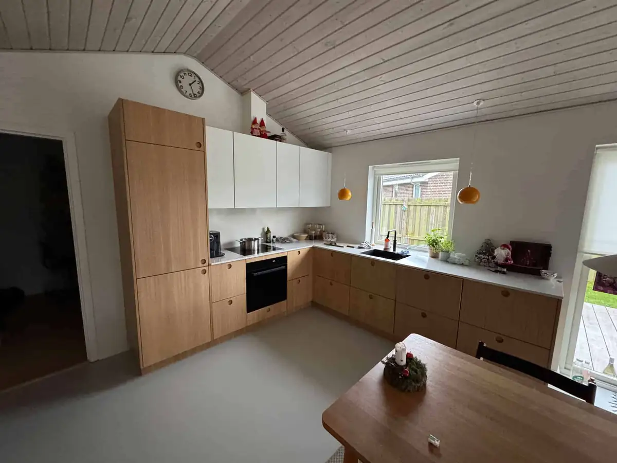Tilbygning Amager — nyt køkken med vaulted wood-loft